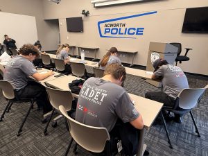 multiple cadets taking a test